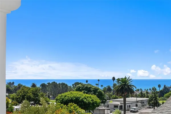 a bathroom with a granite countertop sink a bathtub and a tub