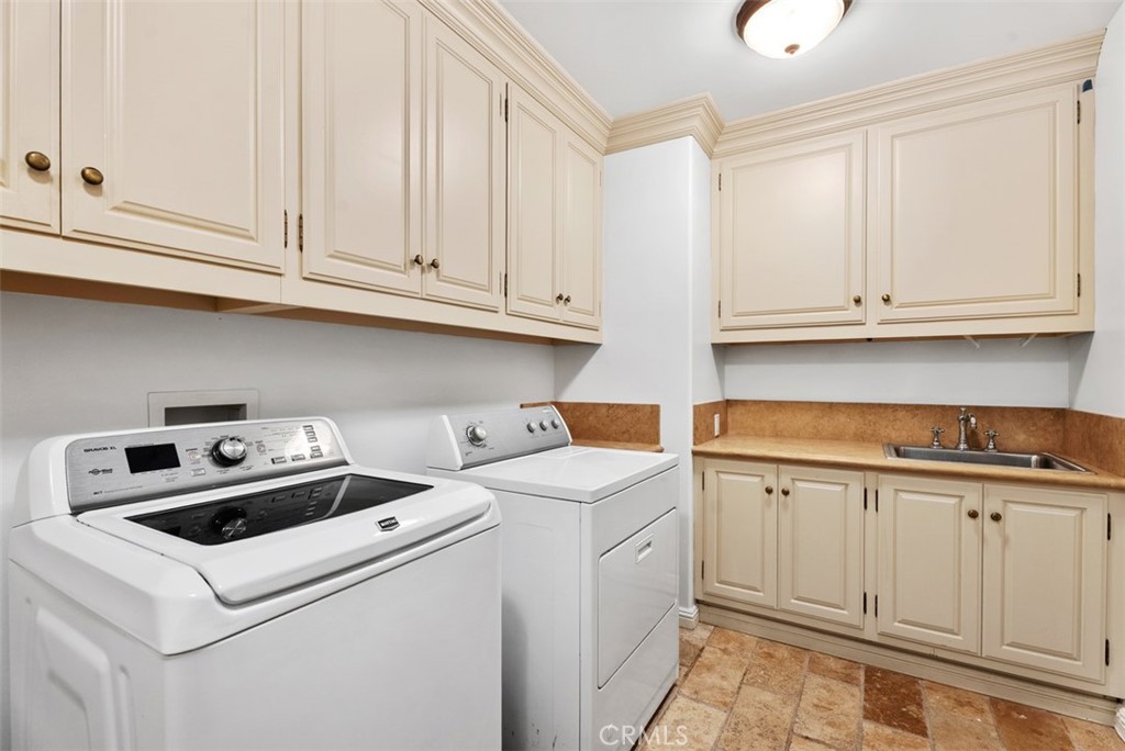 26509 Via Sacramento Dana Point, CA 92624 - Photo 31 of 52 a utility room with dryer and washer