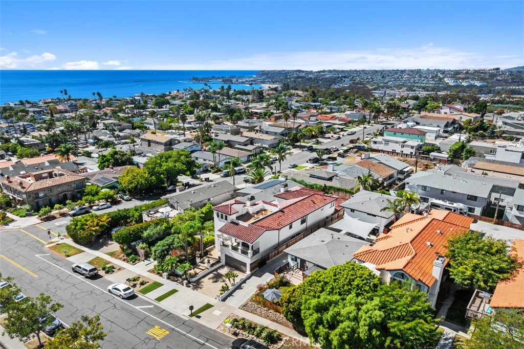 26509 Via Sacramento Dana Point, CA 92624 - Photo 45 of 52 an aerial view of a city with lots of residential buildings and ocean view in back