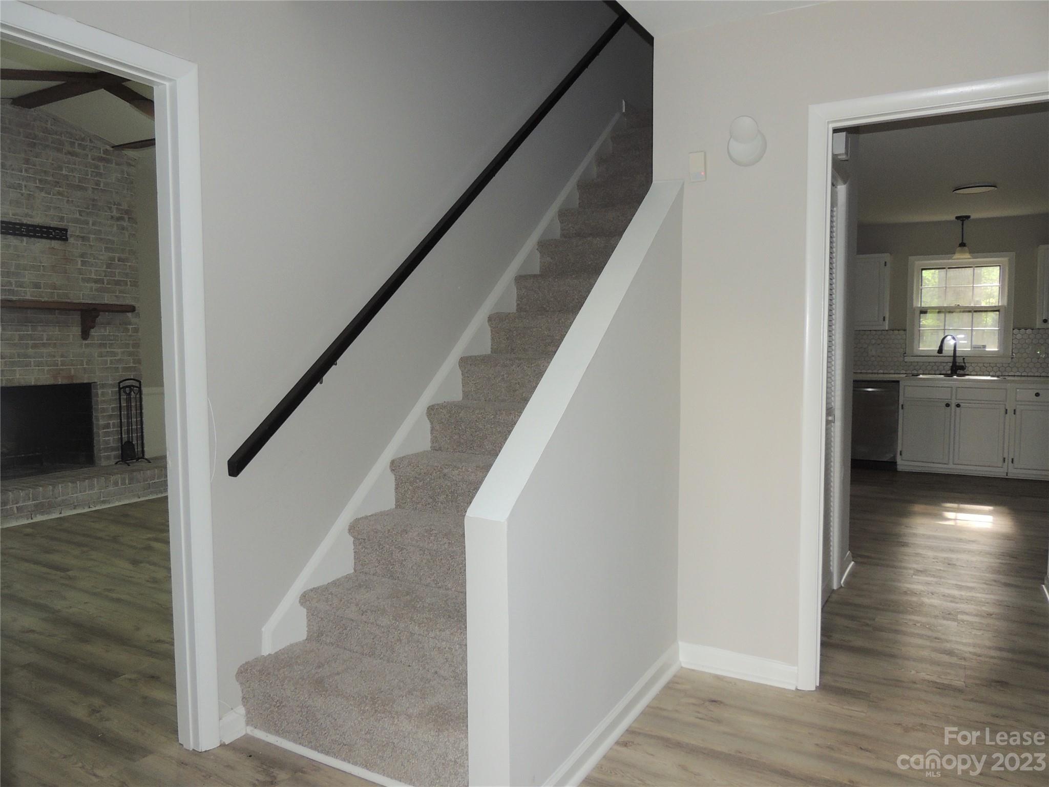 8700 Houston Ridge Road Charlotte, NC 28277 - Photo 3 of 29 a view of entryway and hall with wooden floor