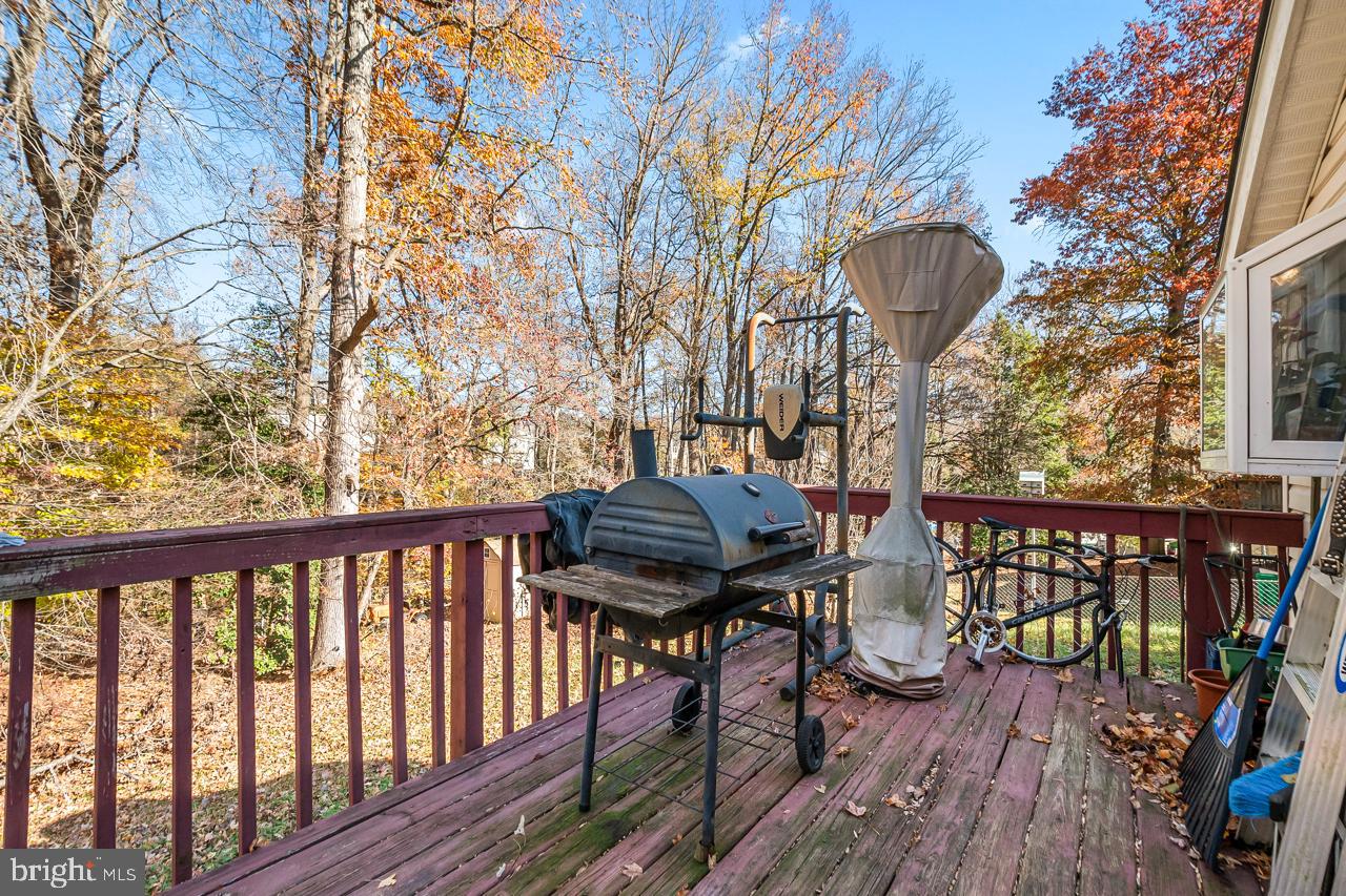 7002 Killarney Street Clinton, MD 20735 - Photo 13 of 26 a view of a deck in the backyard