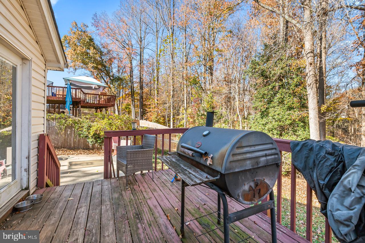 7002 Killarney Street Clinton, MD 20735 - Photo 14 of 26 a view of a patio with iron fence