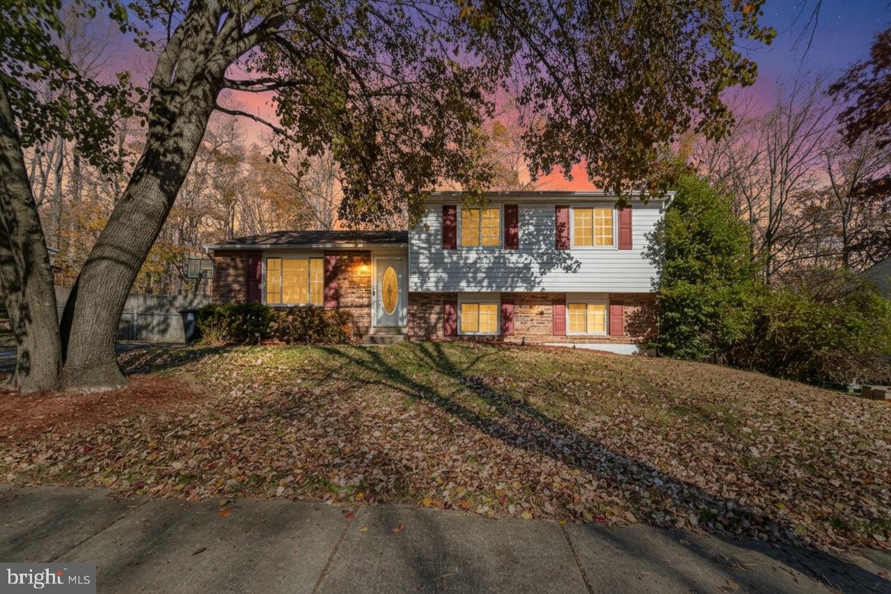 7002 Killarney Street Clinton, MD 20735 - Photo 4 of 26 front view of a house with a tiny house