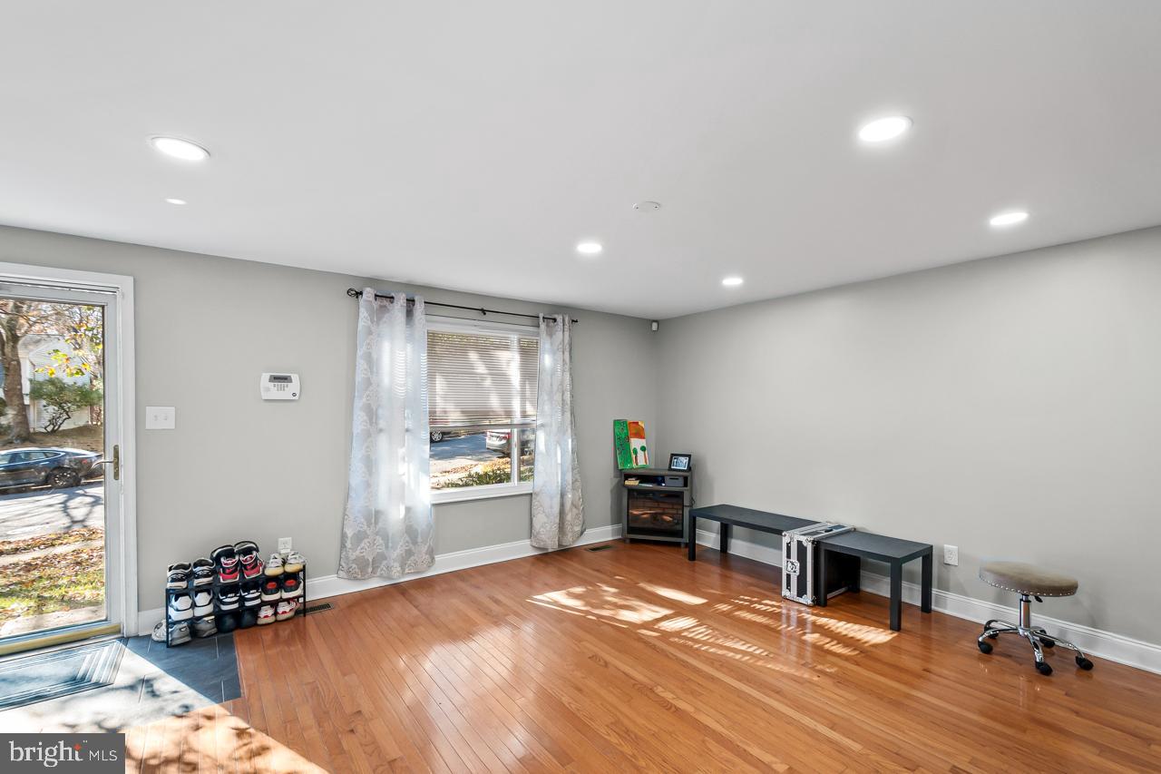 7002 Killarney Street Clinton, MD 20735 - Photo 6 of 26 a room with window and a table