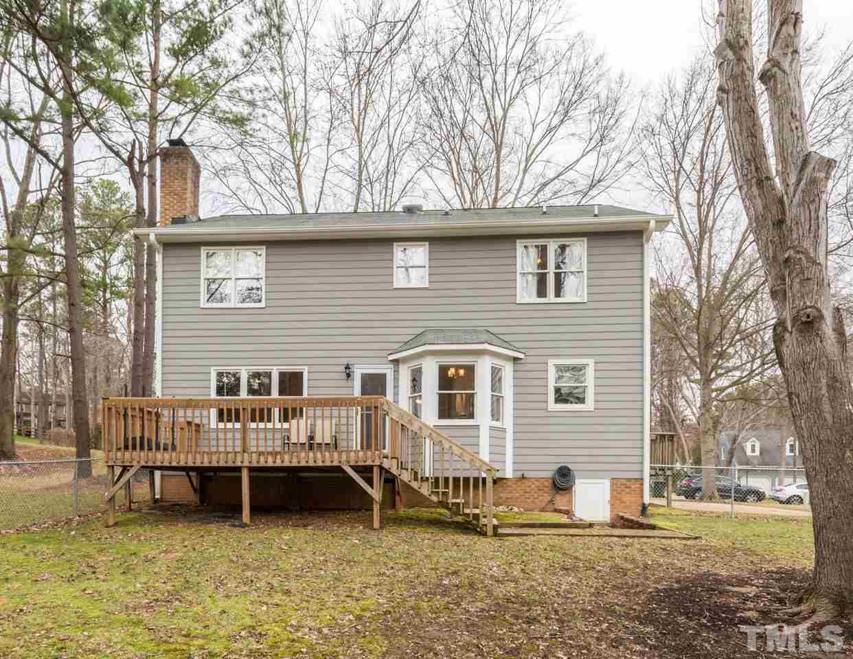 6108 Ivy Ridge Road Raleigh, NC 27612 - Photo 2 of 23 a view of a house with a yard and sitting area
