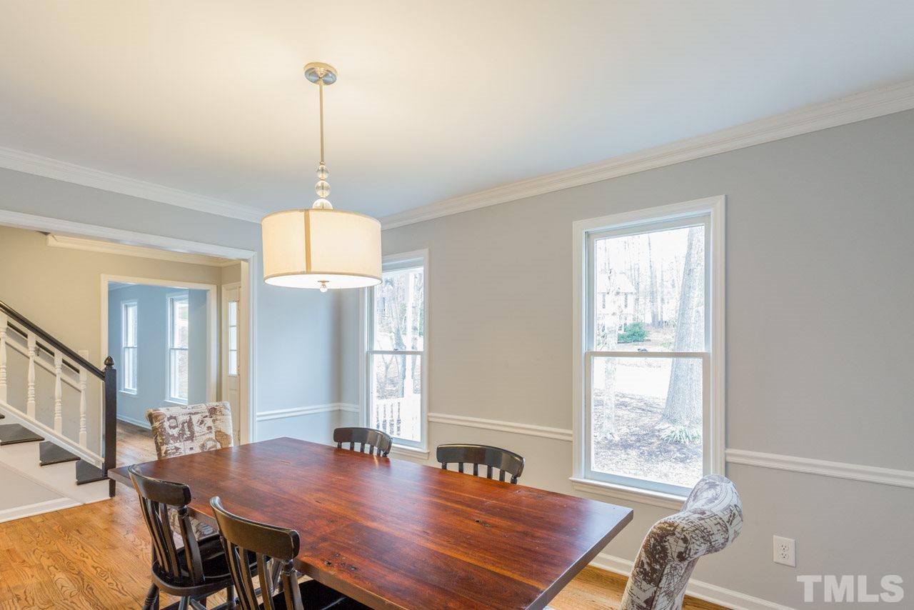 6108 Ivy Ridge Road Raleigh, NC 27612 - Photo 5 of 23 a dining room with furniture and window