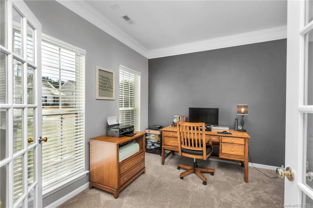 5548 Alexandrite Way, Unit 422 Fort Mill, SC 29708 - Photo 17 of 35 a bedroom with furniture and a window
