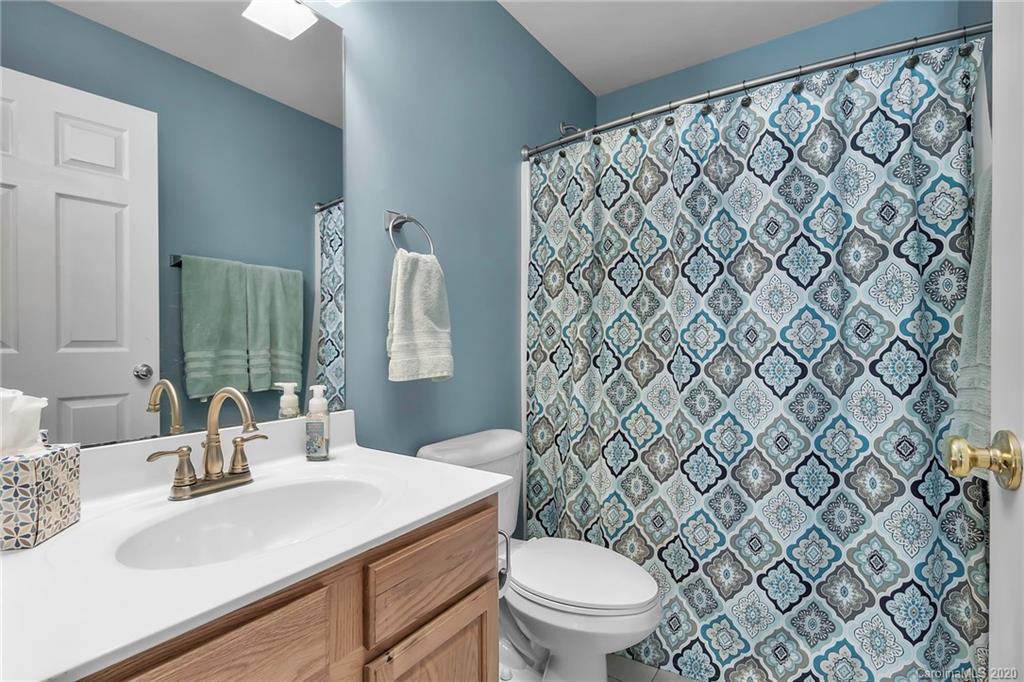 5548 Alexandrite Way, Unit 422 Fort Mill, SC 29708 - Photo 24 of 35 a bathroom with a sink and a toilet
