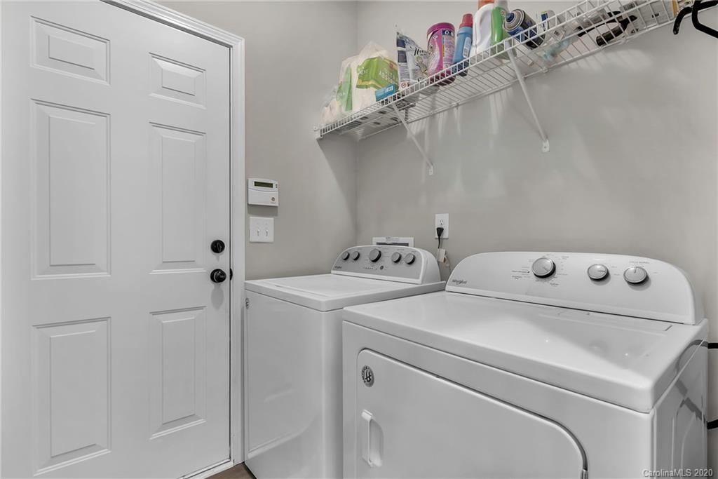 5548 Alexandrite Way, Unit 422 Fort Mill, SC 29708 - Photo 27 of 35 a utility room with dryer and washer