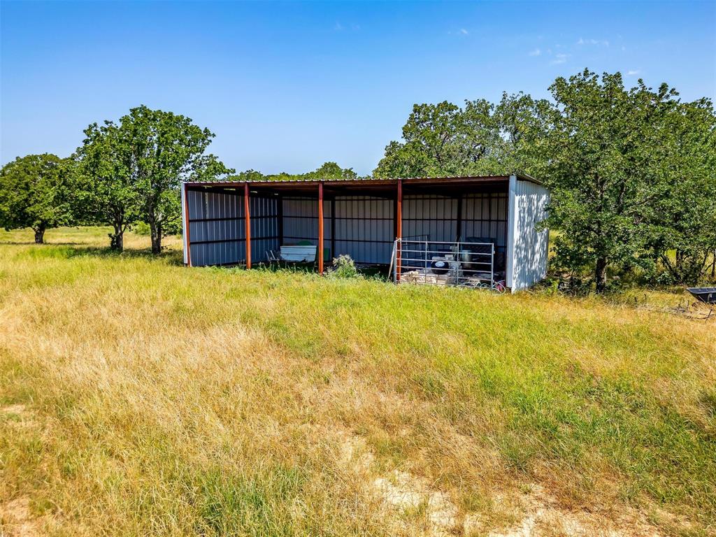 210 Trails End Poolville, TX 76487 - Photo 25 of 25 View of pole building