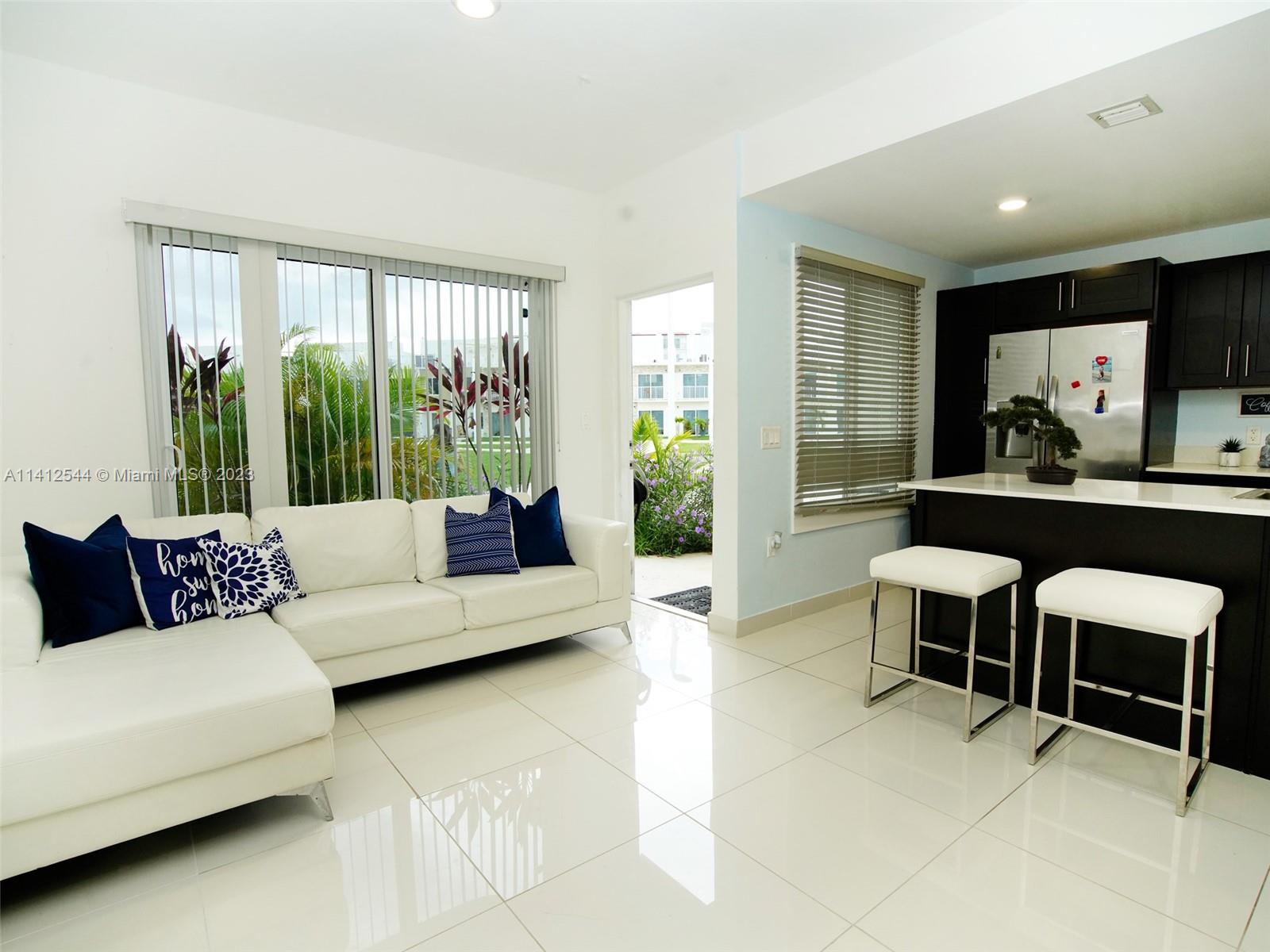 Naranja Homestead, FL 33033 - Photo 1 of 22 a living room with furniture and a large window