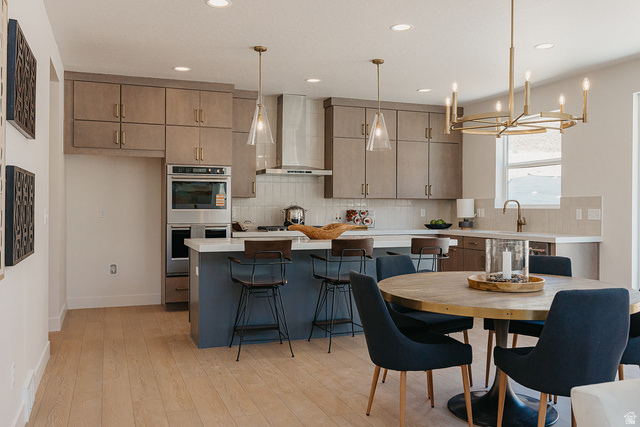 5902 Canyon Rim Road, Unit 620 Lehi, UT 84048 - Photo 38 of 78 Open-concept kitchen and dining area featuring light wood-finish flooring