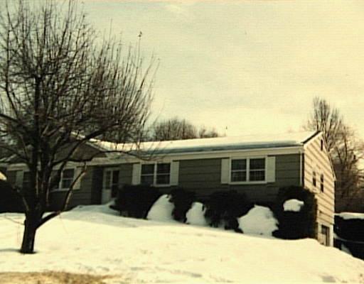 16 Whippoorwill Road Bethel, CT 06801 - Photo 1 of 1 a view of a house with a yard covered in snow
