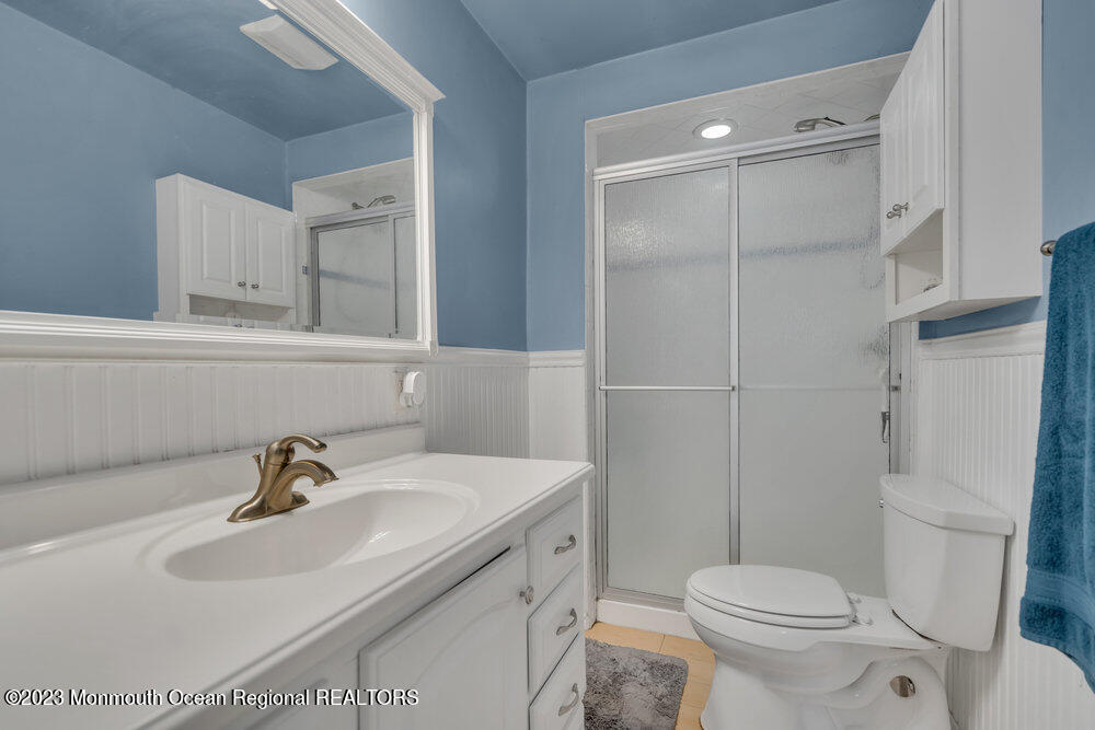 1421 Thomas Street Point Pleasant, NJ 08742 - Photo 17 of 20 a bathroom with a sink toilet and shower
