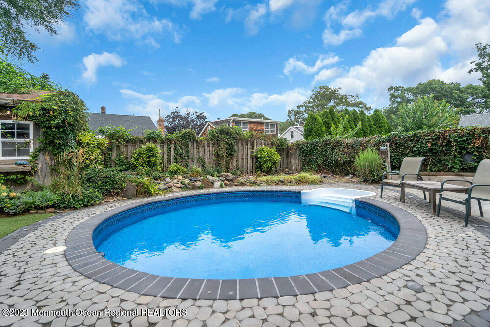 1421 Thomas Street Point Pleasant, NJ 08742 - Photo 5 of 20 a view of a swimming pool with a patio