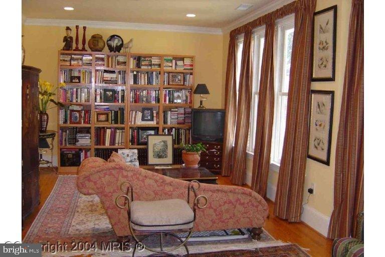 16 7th Street Northeast Washington, DC 20002 - Photo 11 of 15 a living room with lots of furniture and a rug