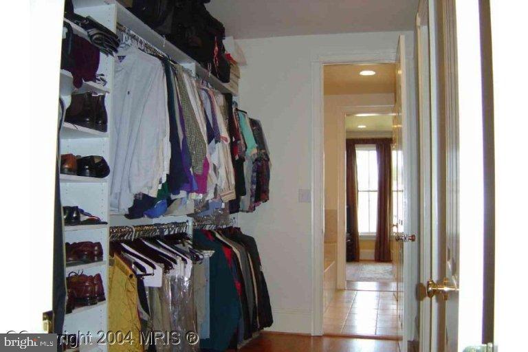 16 7th Street Northeast Washington, DC 20002 - Photo 12 of 15 a view of walk in closet with clothes and shoes