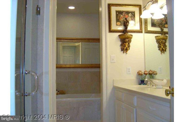 16 7th Street Northeast Washington, DC 20002 - Photo 8 of 15 a bathroom with a sink and mirror
