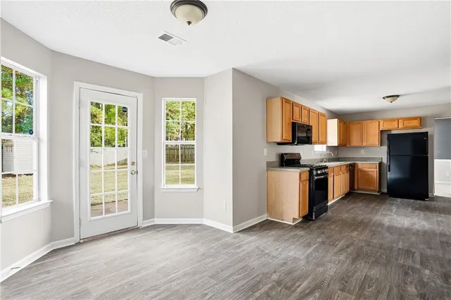 an empty room with windows