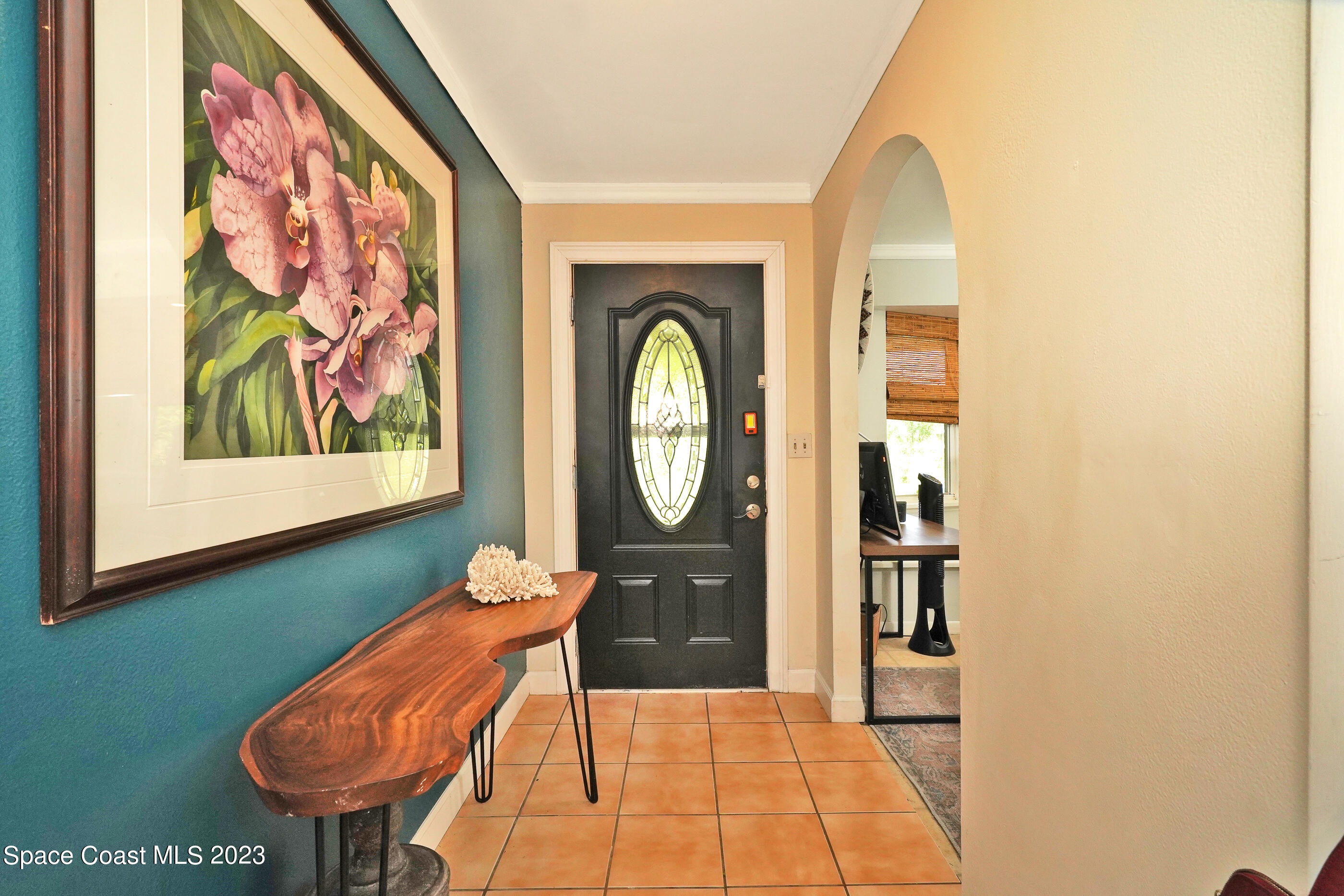 2525 Friday Road Cocoa, FL 32926 - Photo 20 of 77 a living room with furniture and a large window