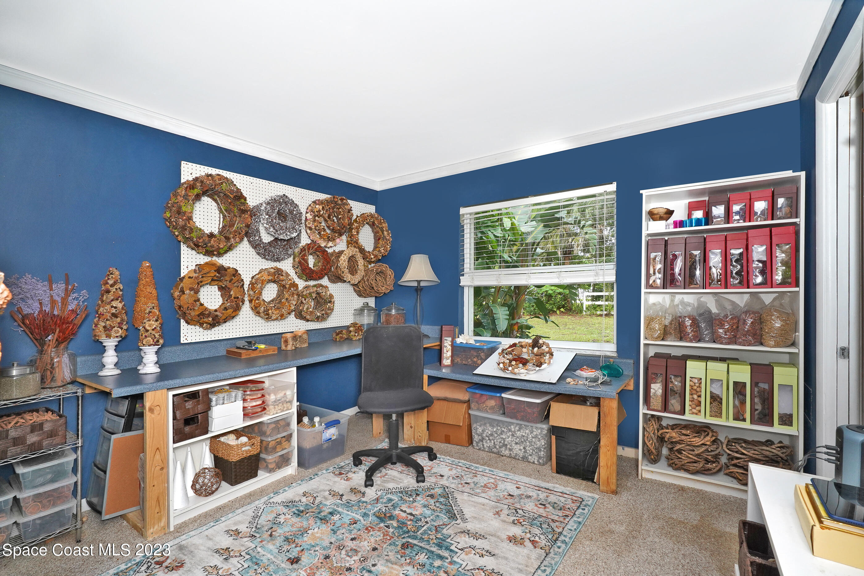 2525 Friday Road Cocoa, FL 32926 - Photo 28 of 77 a living room with furniture and a window