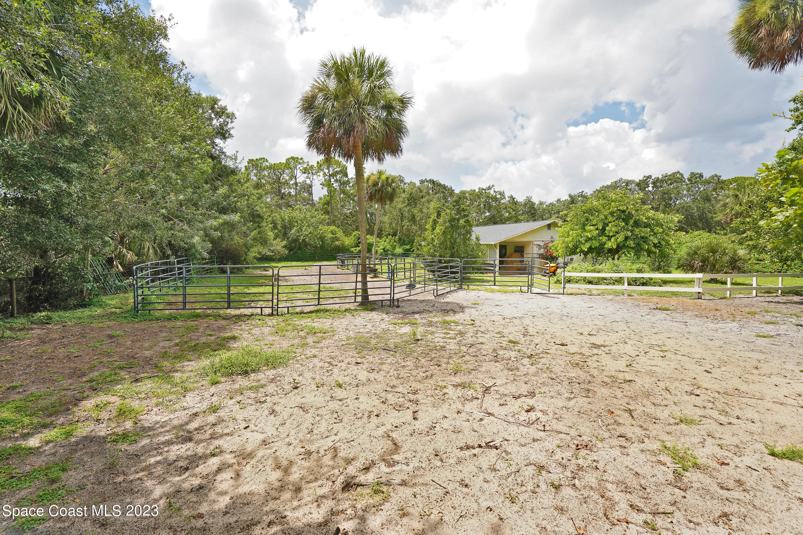 2525 Friday Road Cocoa, FL 32926 - Photo 32 of 77 a view of a yard with basketball court