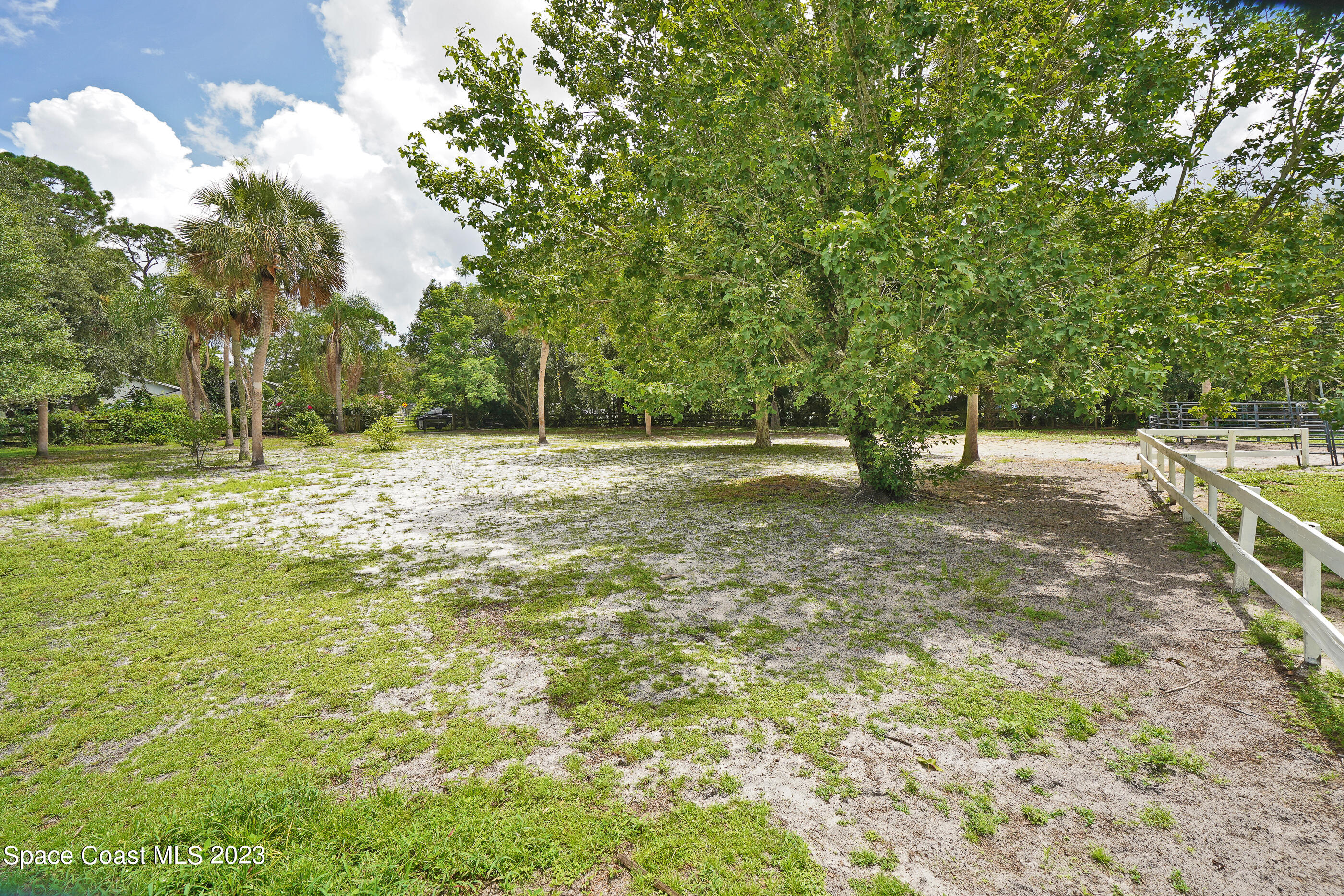 2525 Friday Road Cocoa, FL 32926 - Photo 44 of 77 a backyard of a house with lots of green space
