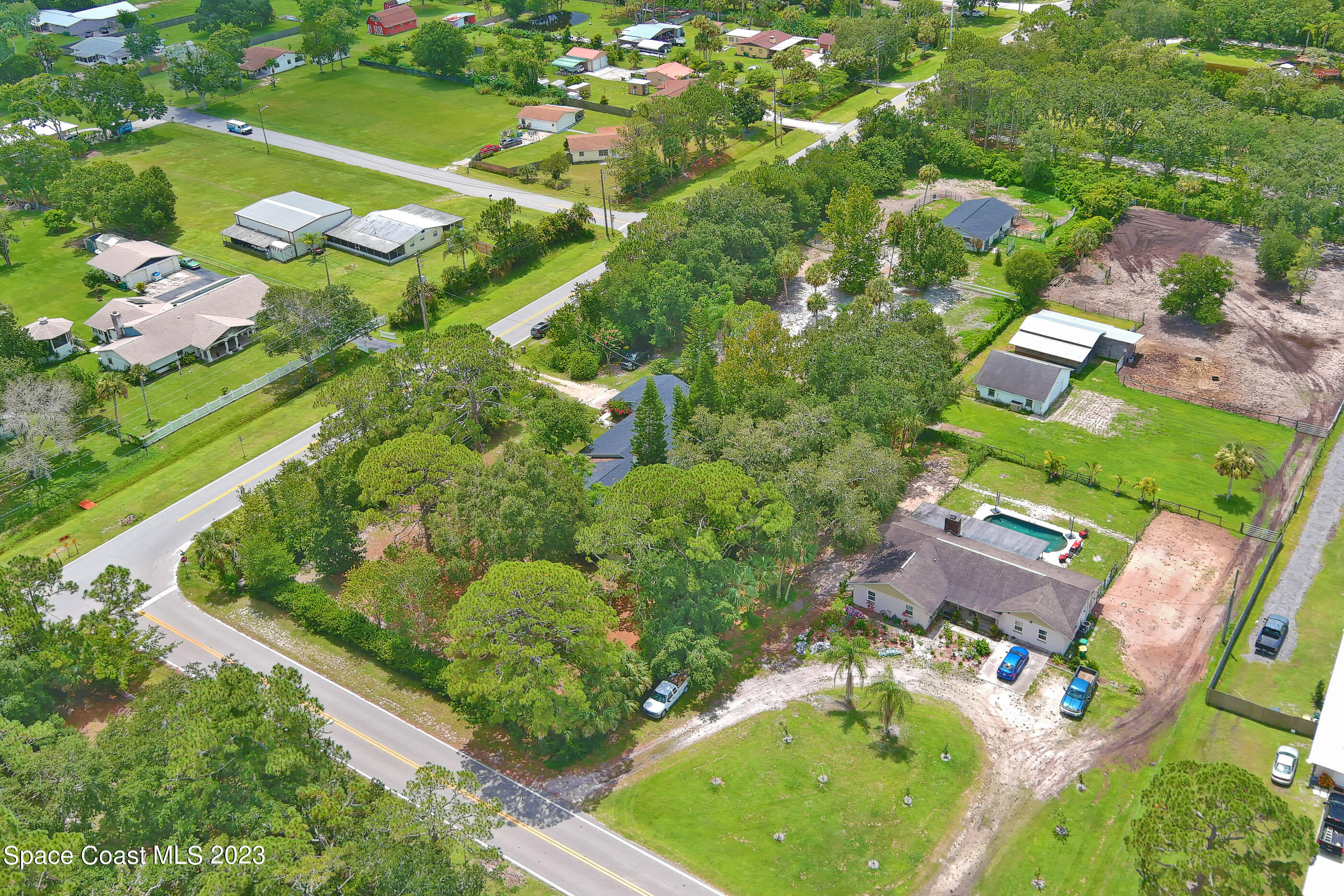 2525 Friday Road Cocoa, FL 32926 - Photo 47 of 77 an aerial view of residential houses with outdoor space and street view