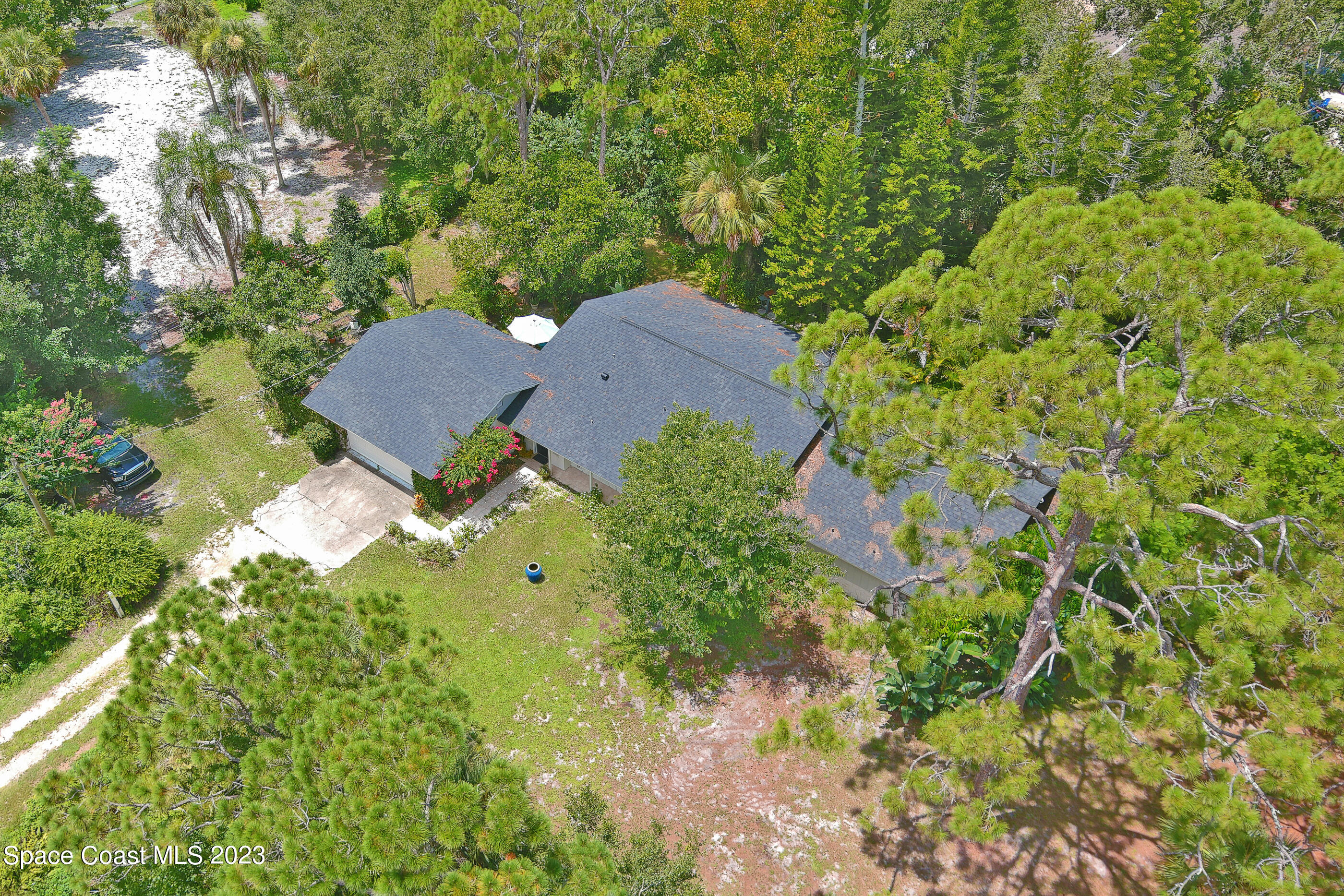 2525 Friday Road Cocoa, FL 32926 - Photo 56 of 77 an aerial view of a house with yard and outdoor space