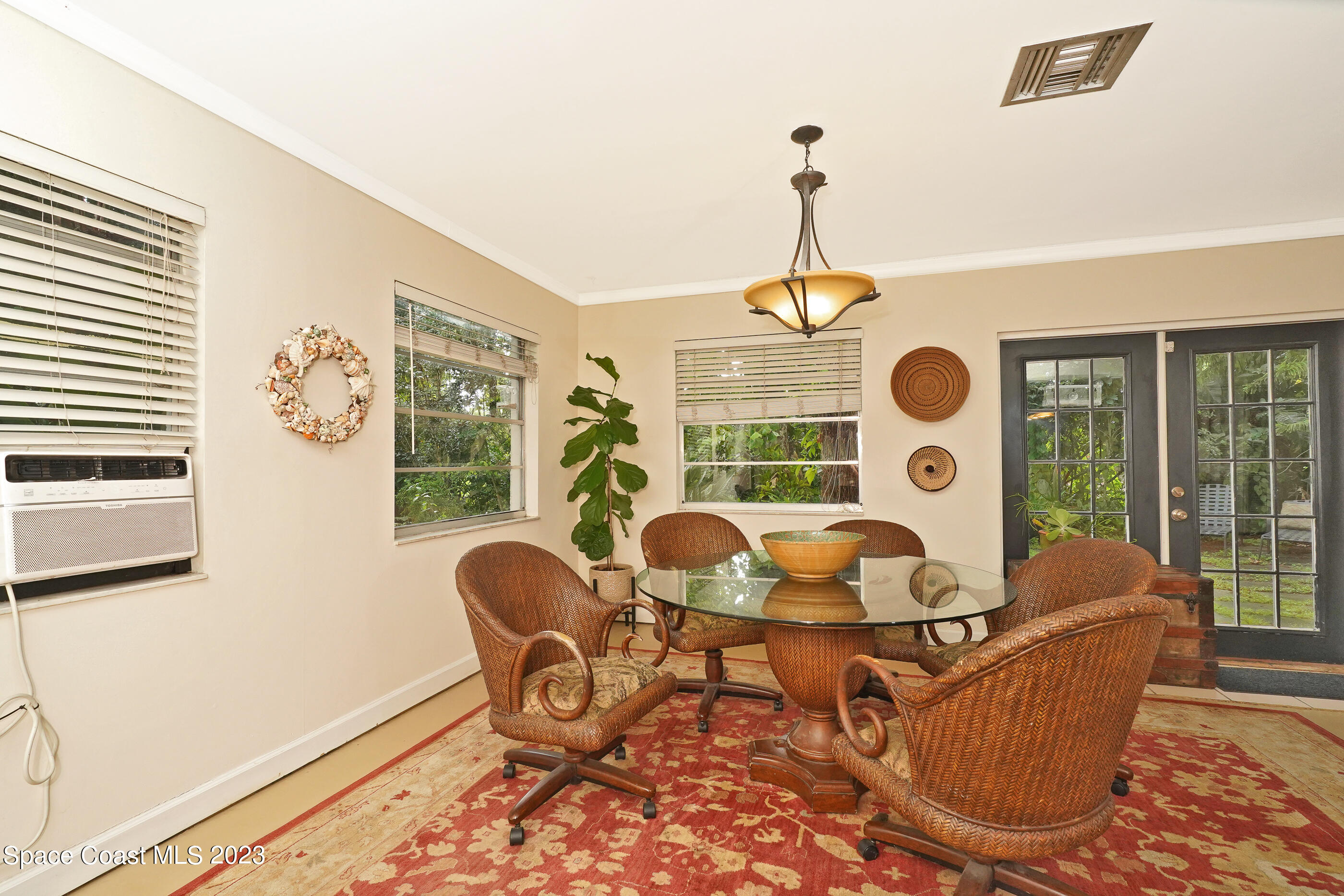 2525 Friday Road Cocoa, FL 32926 - Photo 10 of 77 a living room with furniture and a large window