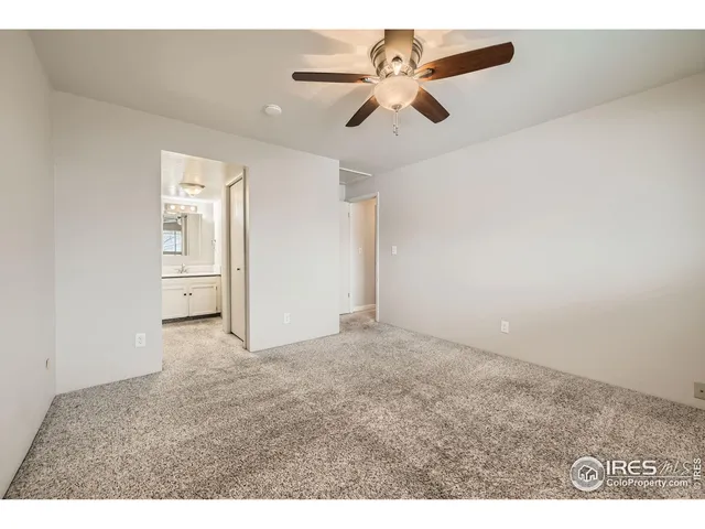 a view of a big room with carpet