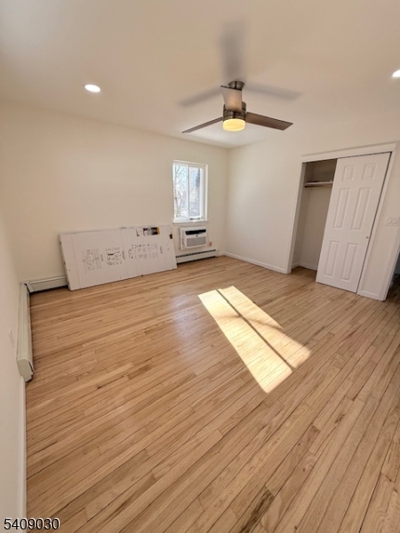 114 North Beverwyck Road, Unit 11 Lake Hiawatha, NJ 07034 - Photo 16 of 17 wooden floor in an empty room with a window