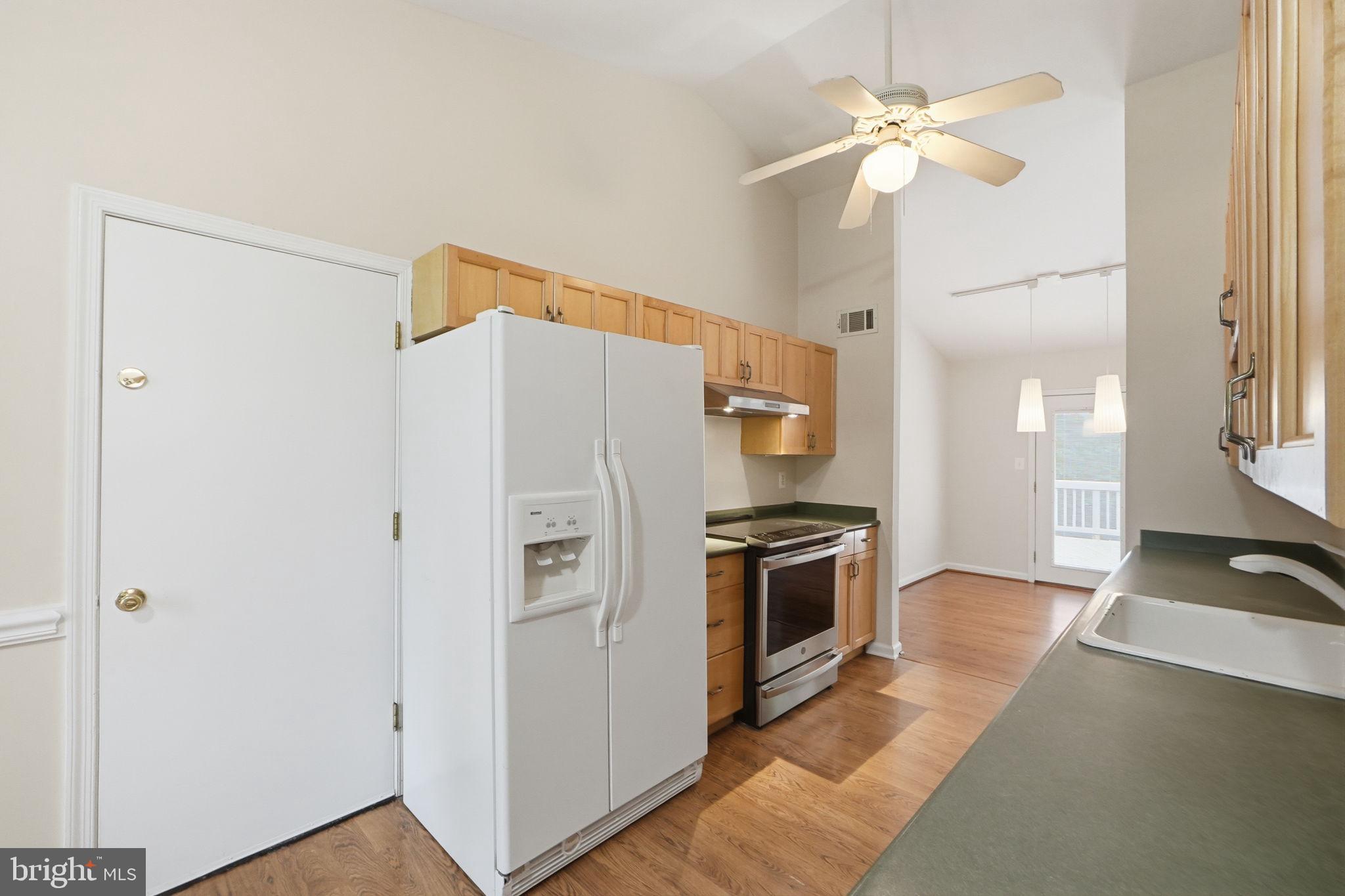14204 Piccadilly Road Silver Spring, MD 20906 - Photo 5 of 42 Kitchen with Access to Garage