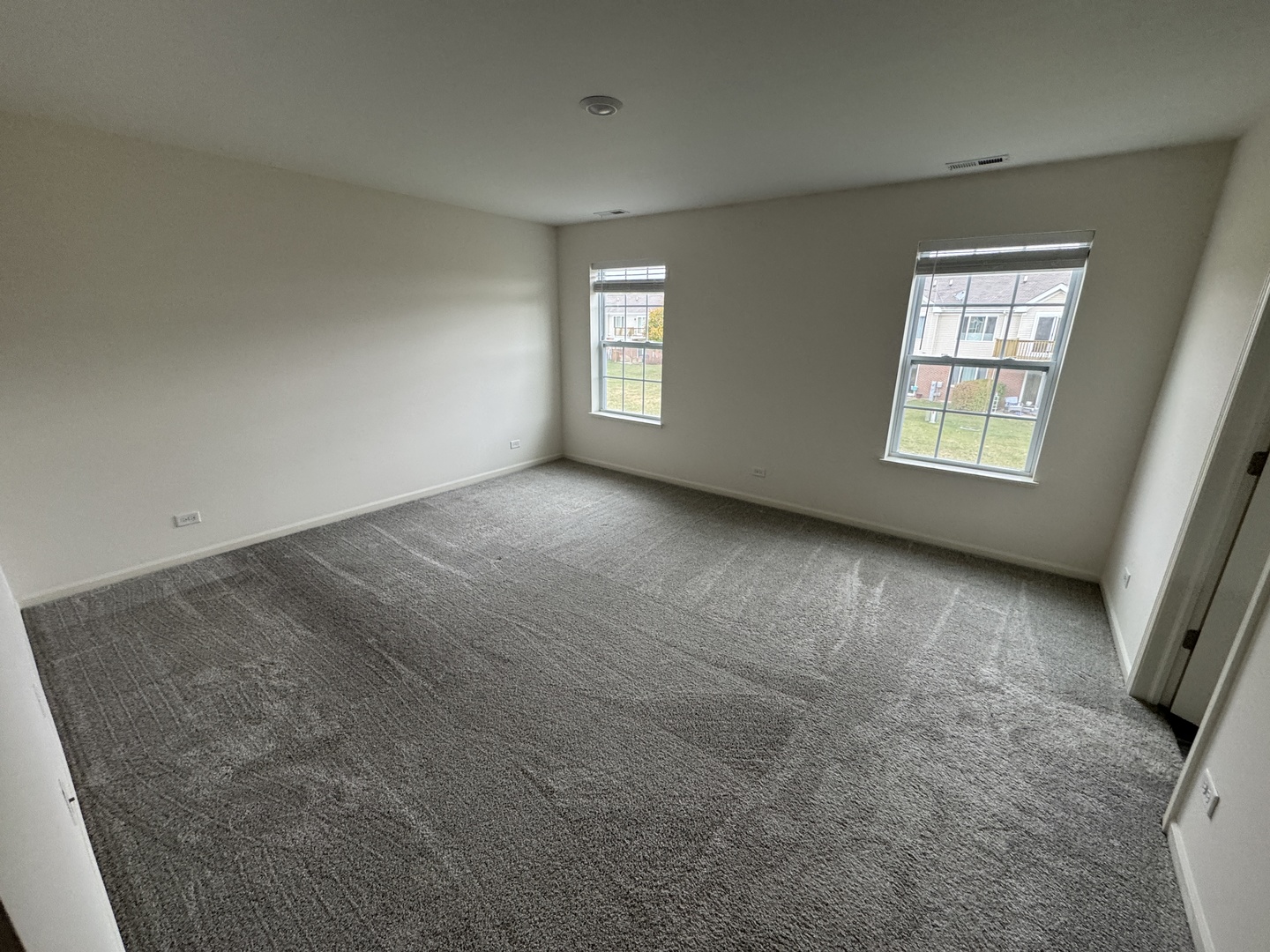 1226 Draper Road McHenry, IL 60050 - Photo 12 of 17 an empty room with windows