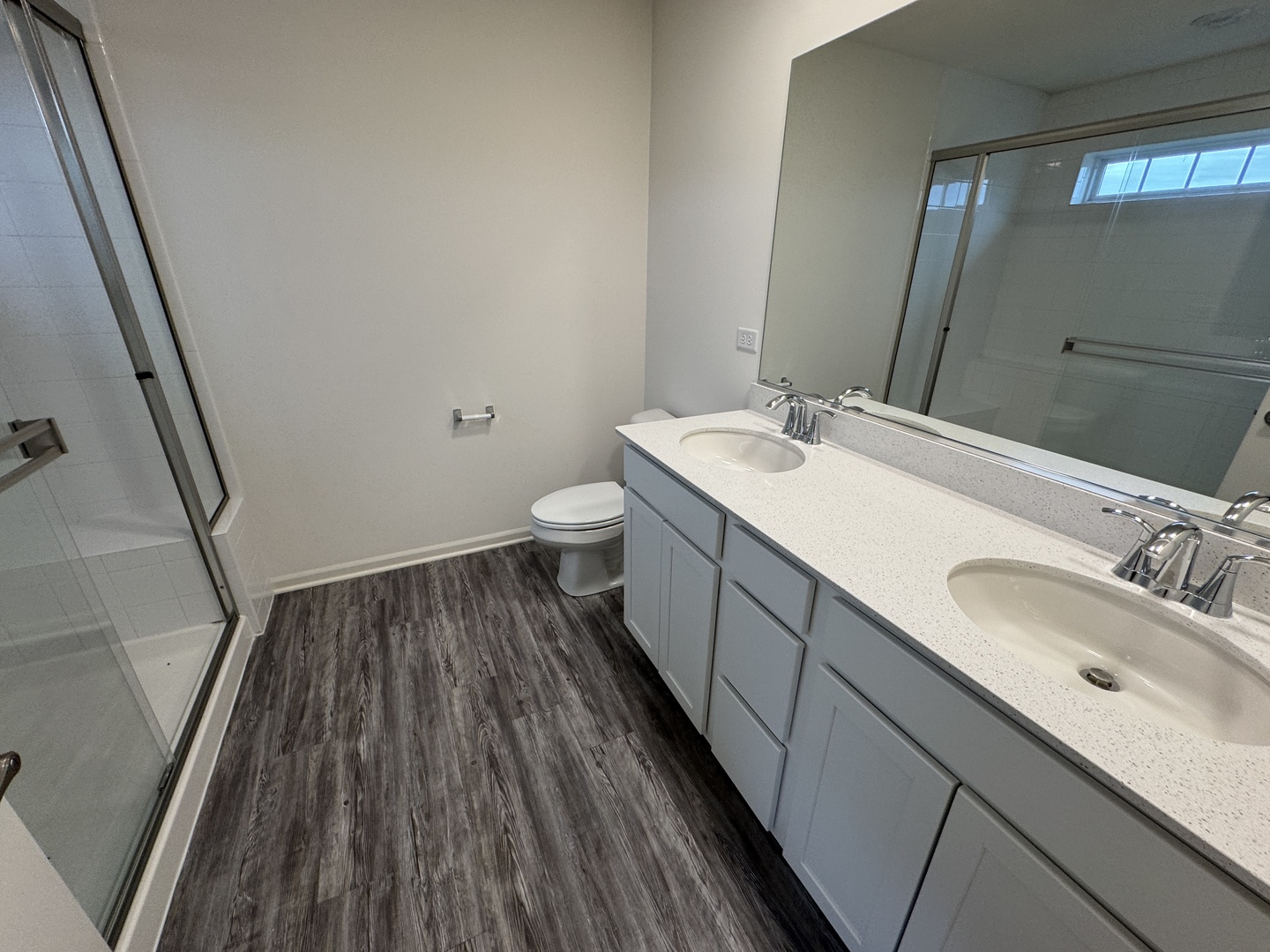 1226 Draper Road McHenry, IL 60050 - Photo 14 of 17 a bathroom with a sink and mirror