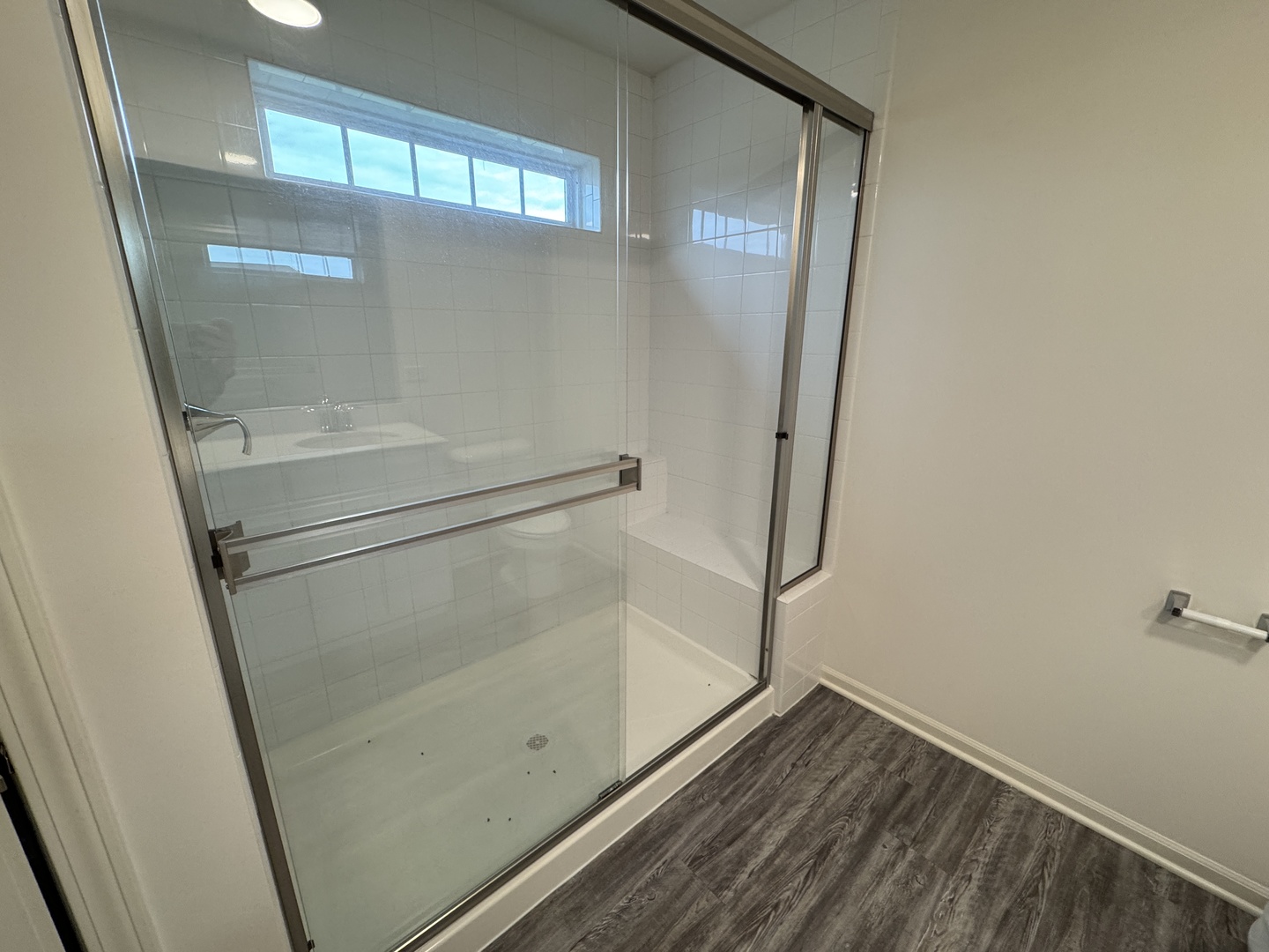 1226 Draper Road McHenry, IL 60050 - Photo 15 of 17 a bathroom with a glass shower door
