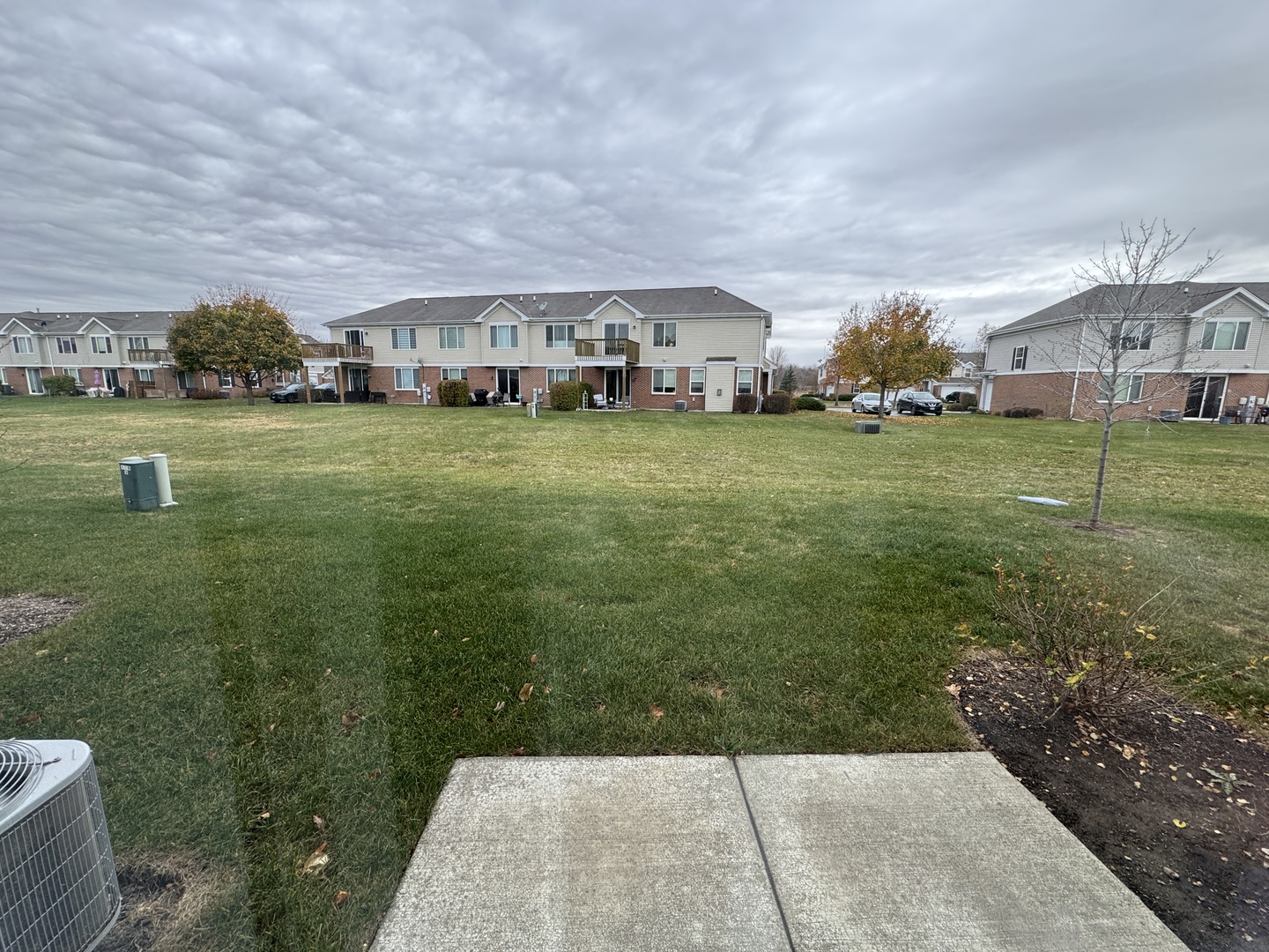 1226 Draper Road McHenry, IL 60050 - Photo 17 of 17 a view of an house with backyard space and balcony