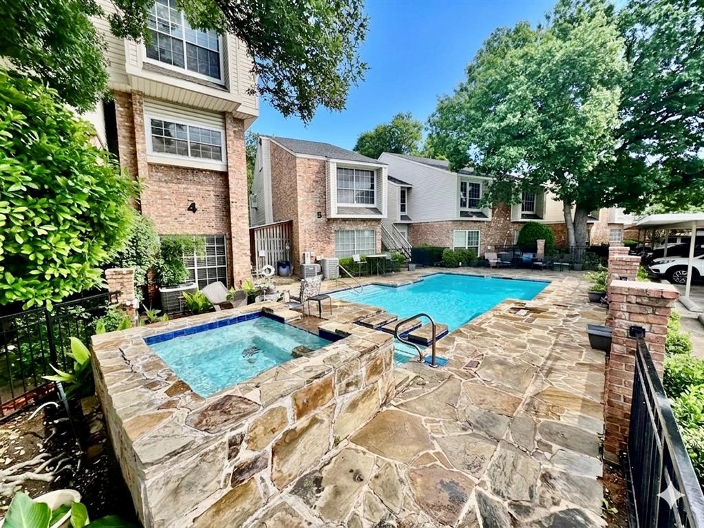 6315 Campbell Road, Unit 509 Dallas, TX 75248 - Photo 1 of 6 a view of a house with backyard sitting area and garden