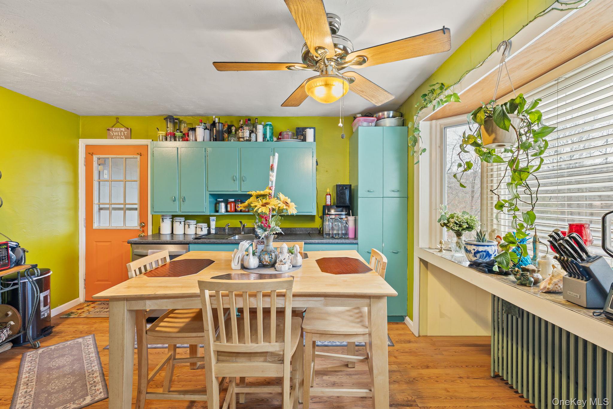 11 Cross Creek Road Cold Spring, NY 10516 - Photo 13 of 43 a view of a dining room with furniture a chandelier and wooden floor