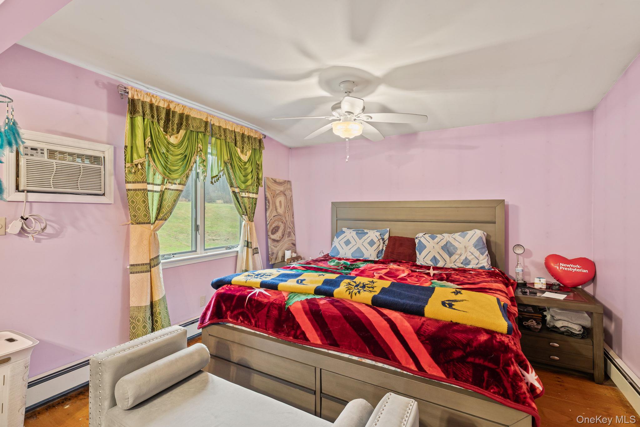 11 Cross Creek Road Cold Spring, NY 10516 - Photo 20 of 43 a bedroom with a bed and a window