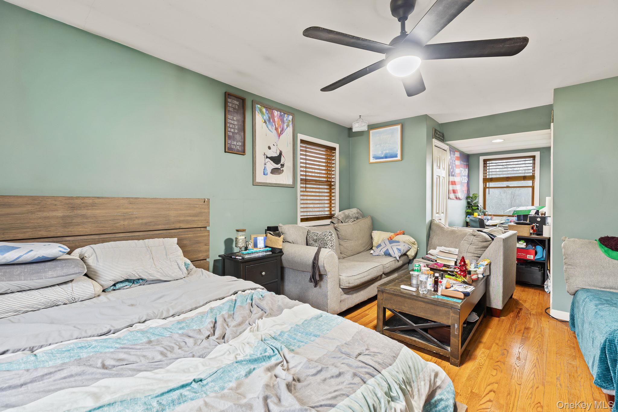 11 Cross Creek Road Cold Spring, NY 10516 - Photo 27 of 43 a bedroom with a bed and wooden floor
