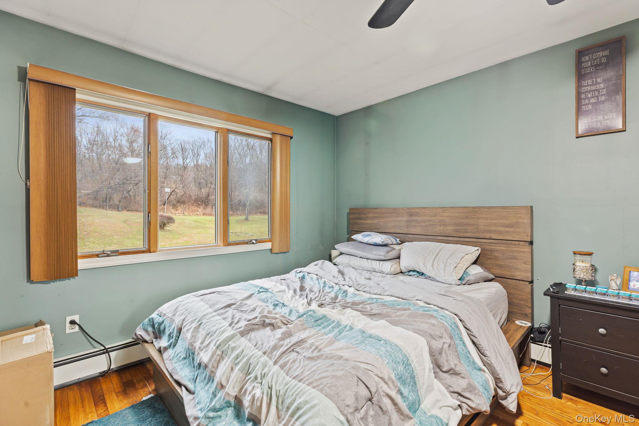 11 Cross Creek Road Cold Spring, NY 10516 - Photo 29 of 43 a bedroom with a bed and a window