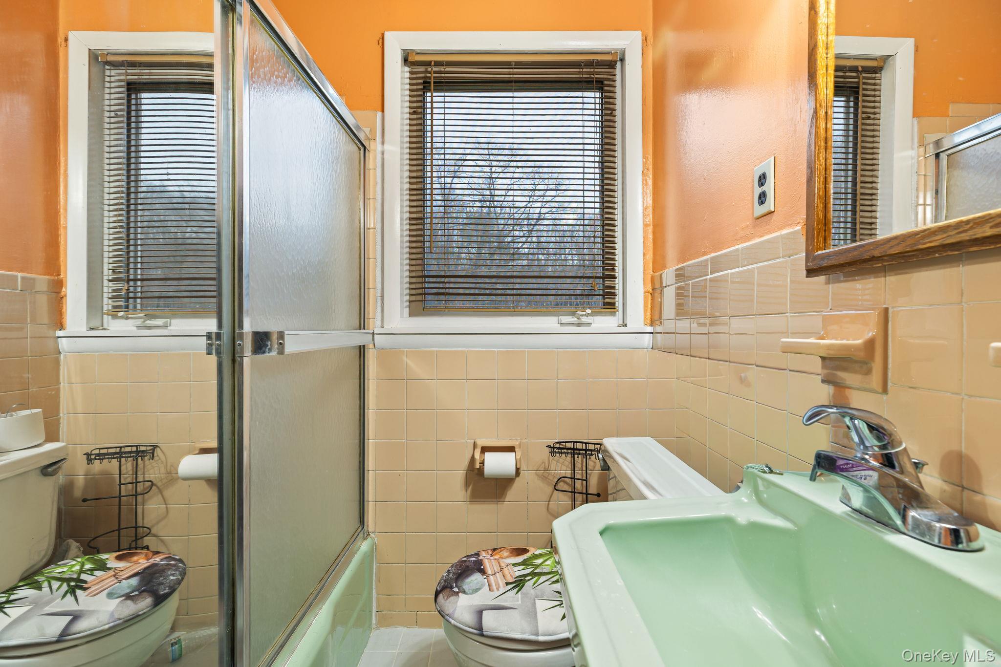 11 Cross Creek Road Cold Spring, NY 10516 - Photo 33 of 43 a bathroom with a sink and a window