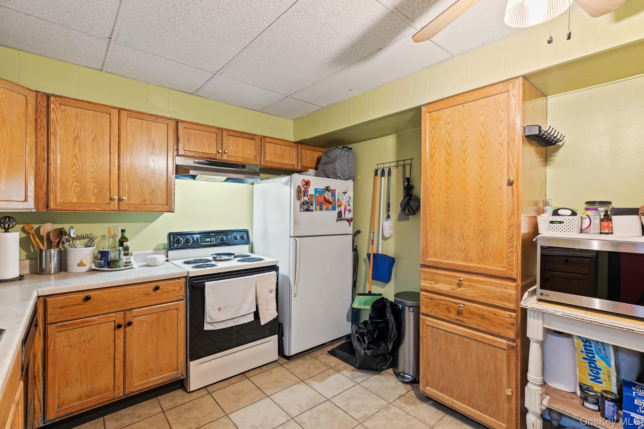 11 Cross Creek Road Cold Spring, NY 10516 - Photo 36 of 43 a kitchen with a refrigerator stove and sink