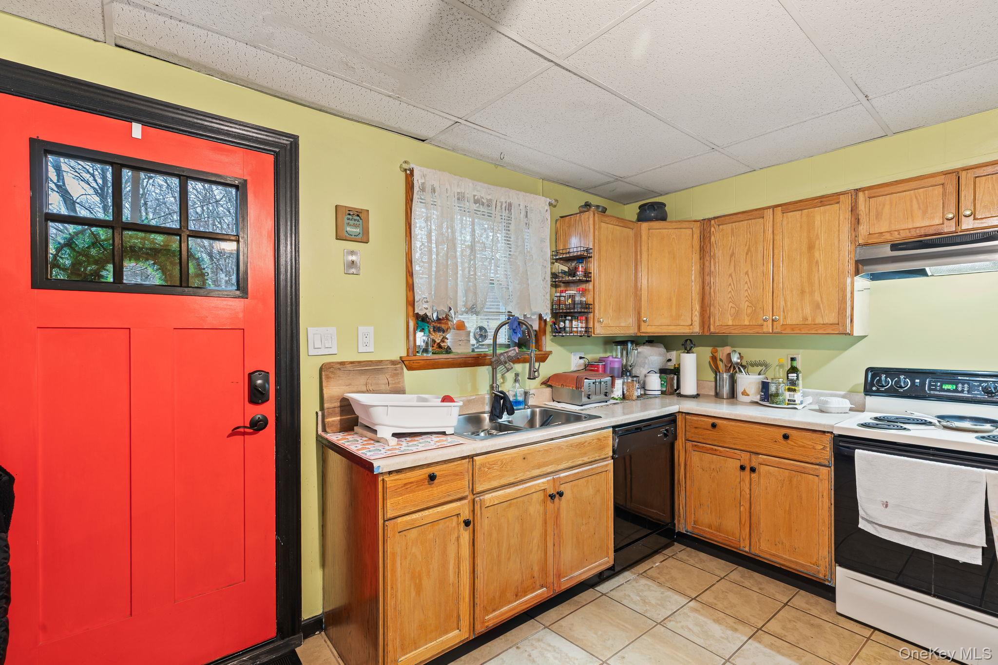 11 Cross Creek Road Cold Spring, NY 10516 - Photo 37 of 43 a kitchen with a sink stove and cabinets