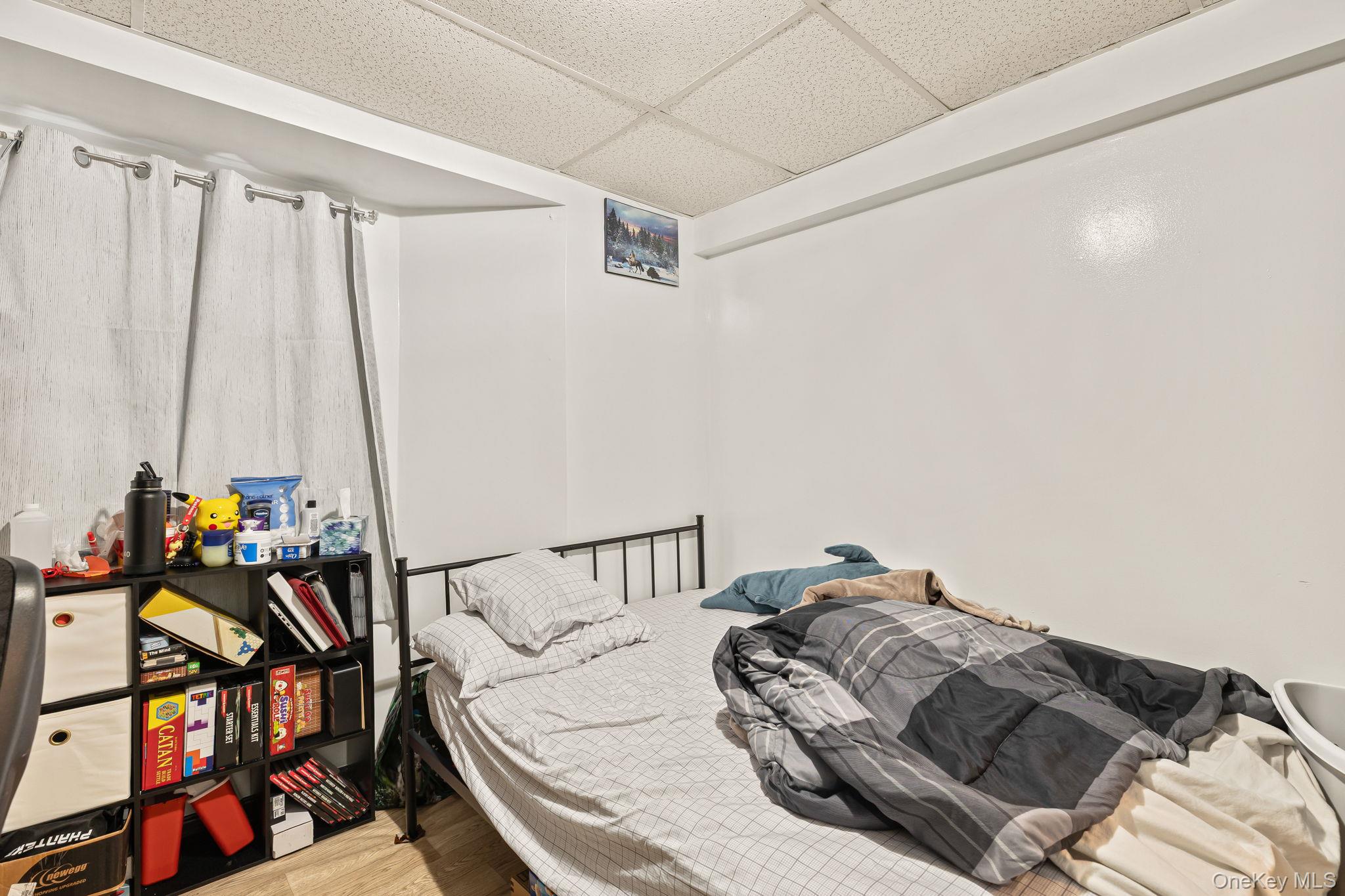 11 Cross Creek Road Cold Spring, NY 10516 - Photo 42 of 43 a bedroom with a bed and a window