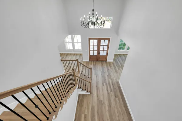 a view of entryway with wooden floor