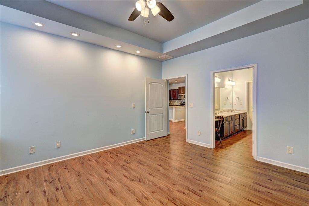 505 Riverview Lane Canton, GA 30114 - Photo 14 of 34 wooden floor in an empty room with a window