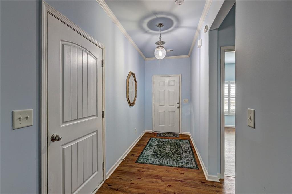 505 Riverview Lane Canton, GA 30114 - Photo 2 of 34 a view of room with window and hardwood floor