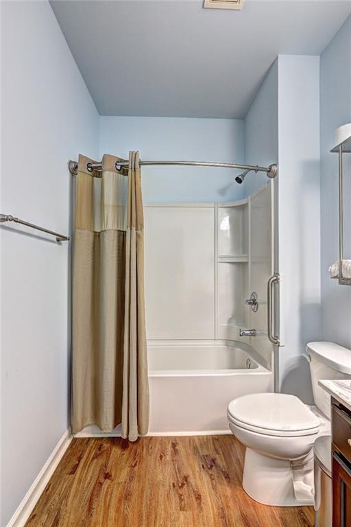 505 Riverview Lane Canton, GA 30114 - Photo 27 of 34 a bathroom with a toilet and a shower